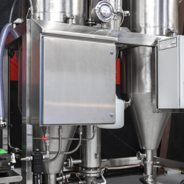 A complete Pulse Combustion spray drying system featuring stainless steel cyclones, integrated control panels, and a precision feed pump—a comprehensive industrial drying solution.
