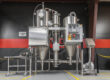 A compact industrial spray dryer system from Pulse Combustion Systems, an example of our high-performance spray drying equipment, assembled and ready in our staging area.