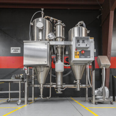 A compact industrial spray dryer system from Pulse Combustion Systems, an example of our high-performance spray drying equipment, assembled and ready in our staging area.