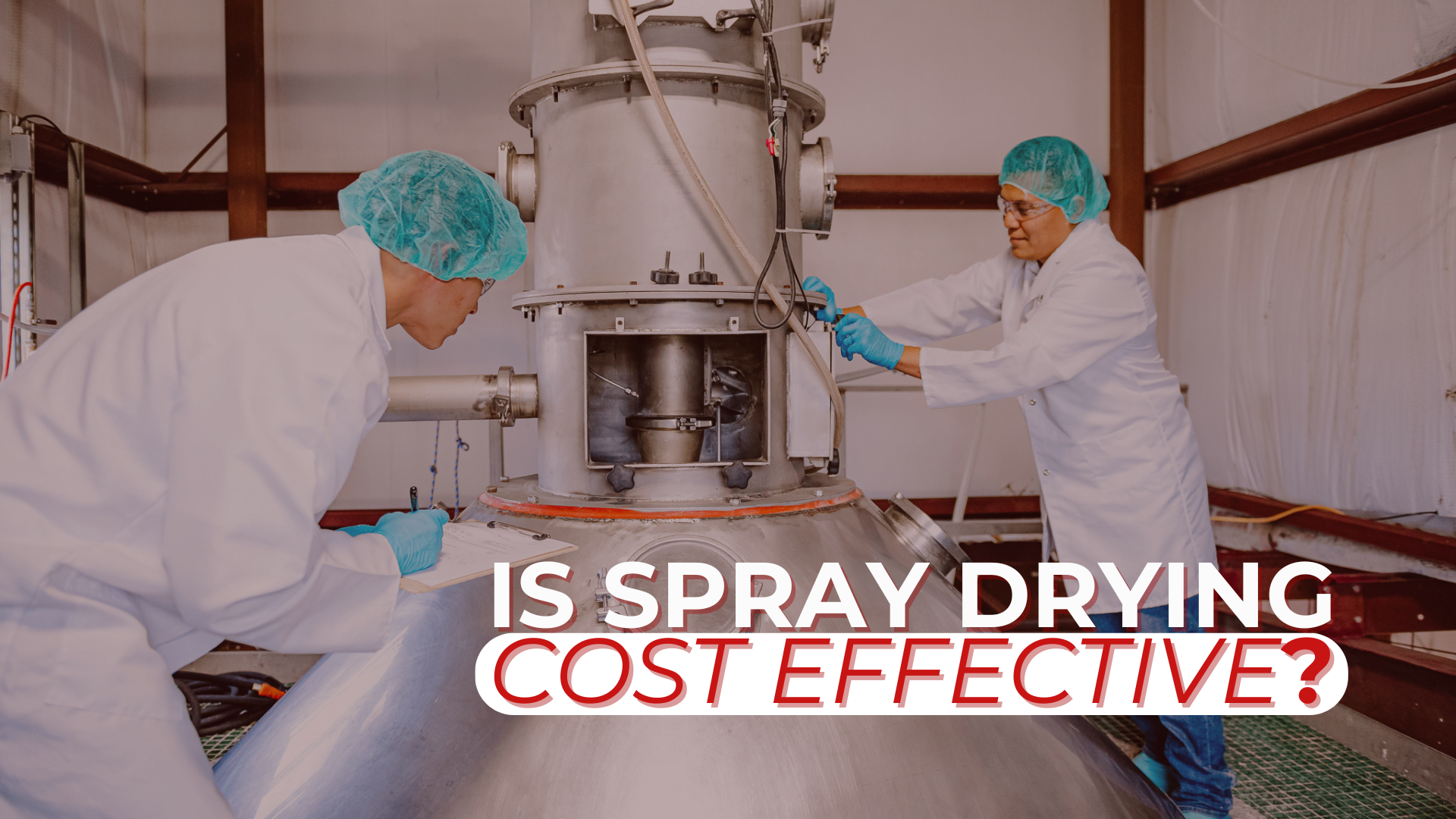 Two scientists in lab coats and hairnets working on a large industrial spray dryer. Overlaid white and red text asks: 'IS SPRAY DRYING COST EFFECTIVE?'