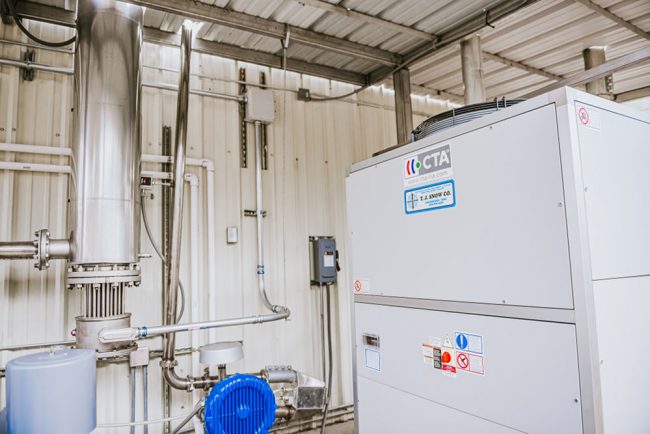 An industrial spray dryer system with its pulse combustion system installed in a facility, showcasing the advanced spray drying equipment manufactured by https://www.pulsedry.com/.